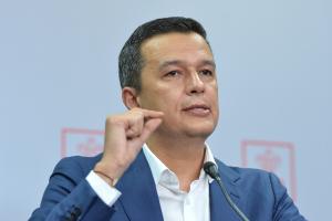 Tensiuni majore &icirc;n Coaliție: PSD cere demisia lui Bolojan după numirea lui Mihai Savin la Vamă